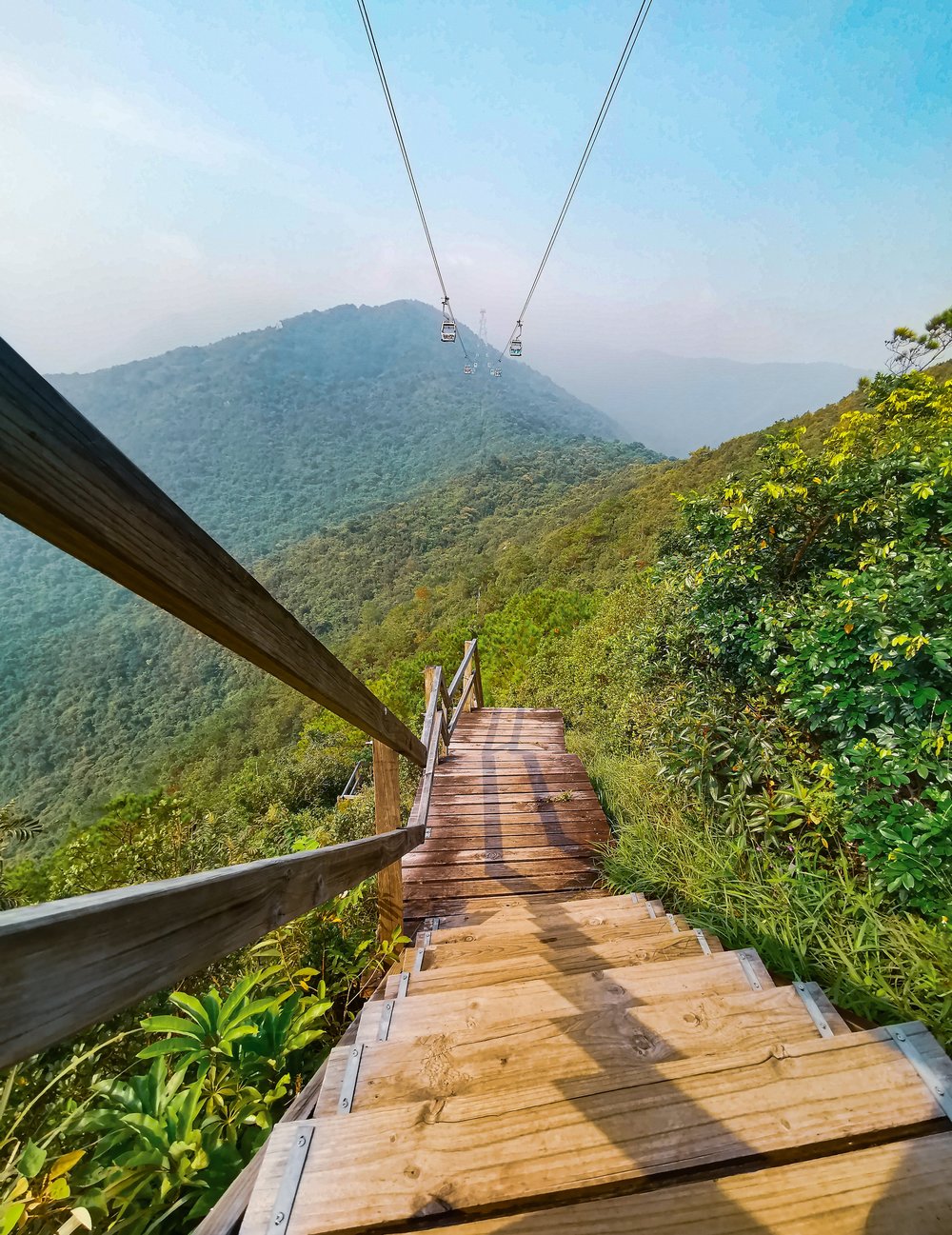 wooden stairs at ngong ping trail hong kong 