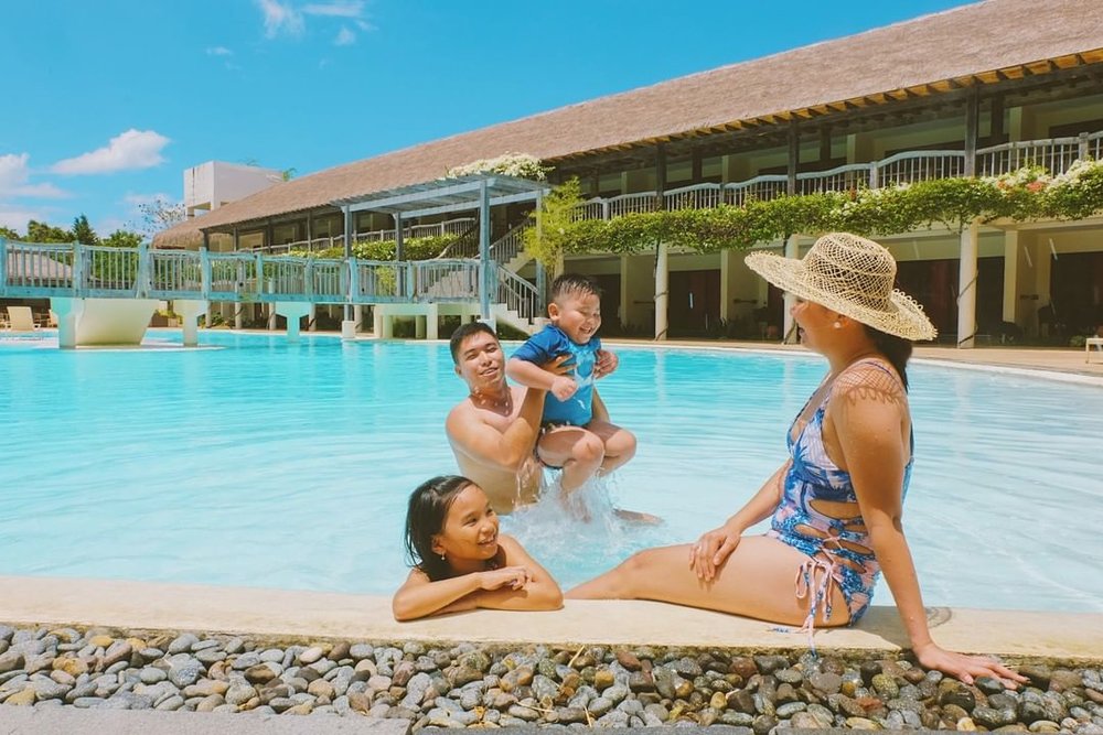 family in pool at bluewater panglao