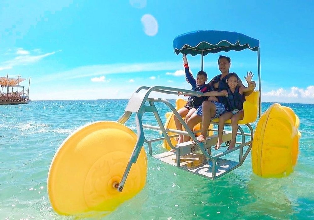 family on water bike at jpark island resort