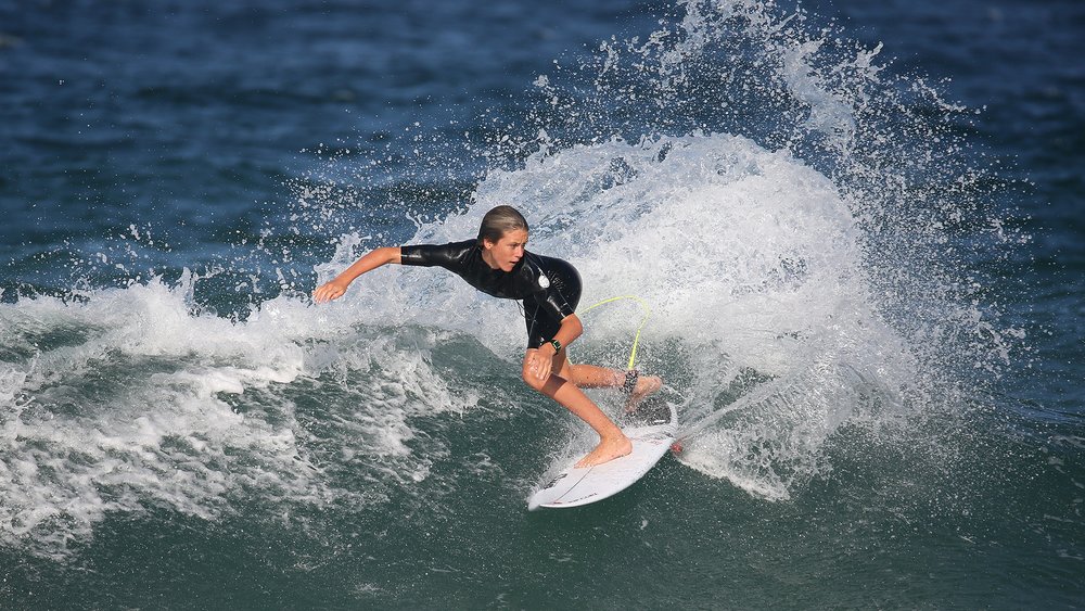 Take advantage of the waves and go surfing Credit: WARWICK MARTIN