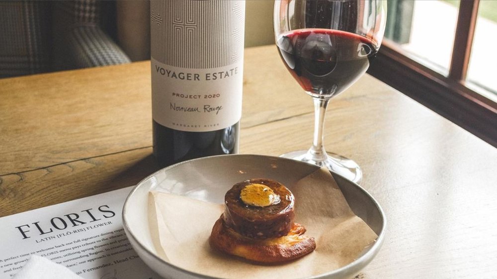 Indulge in gourmet dishes complemented by a glass of fantastic wine Credit: @voyagerestate