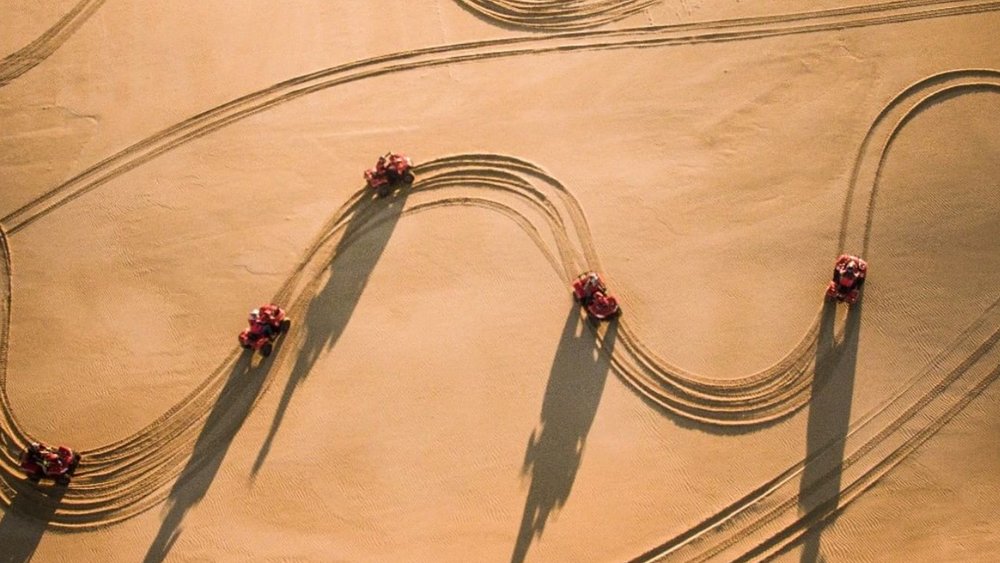 Quad bikes, golden sand, and family make for a great picture