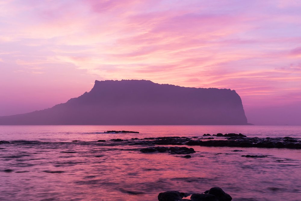 At the summit of Seongsan Sunrise Peak you can see the center of a volcanic tuff cone and the whole east side of Jeju Island. Image Credits - Jeju Tourism Organization