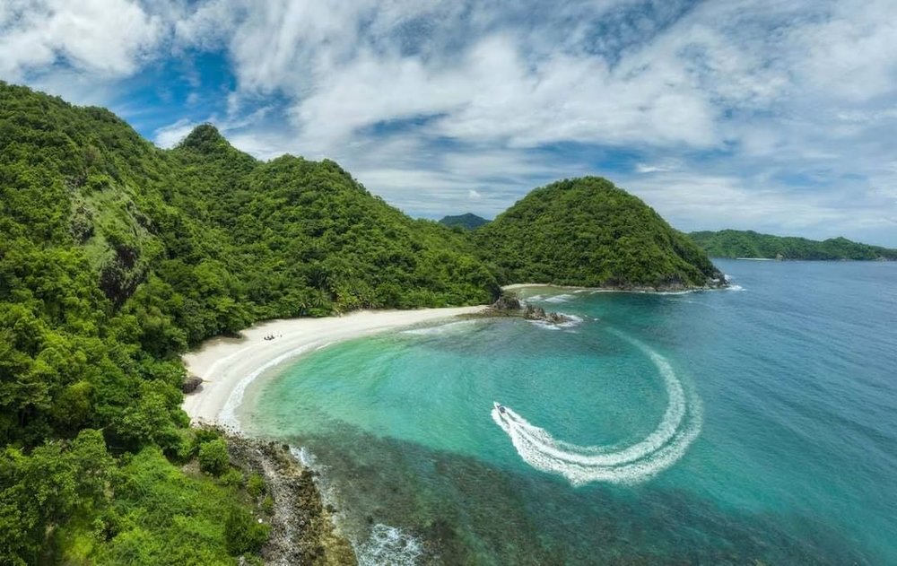 hilly white sand beach