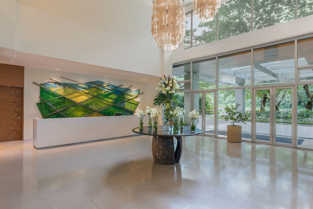 table with white flowers in hotel lobby