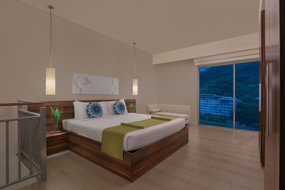 hotel room with floor to ceiling window