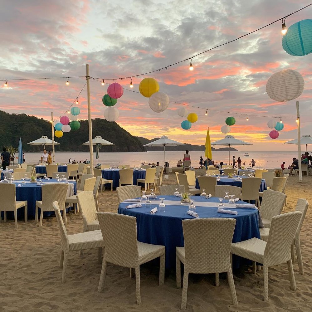 dining by the beach during sunset