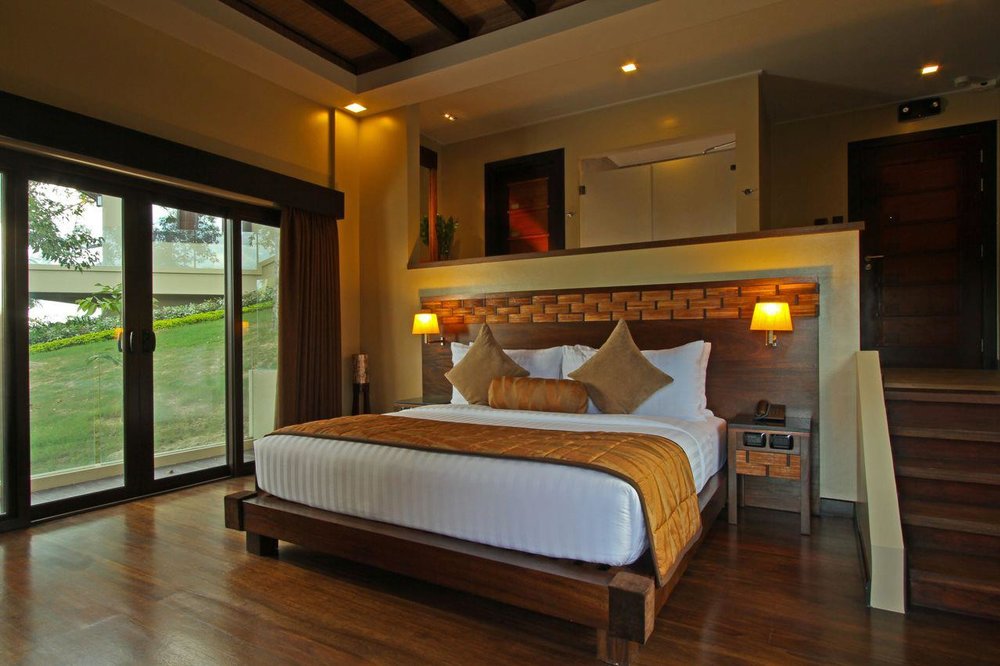 hotel room with wooden accents