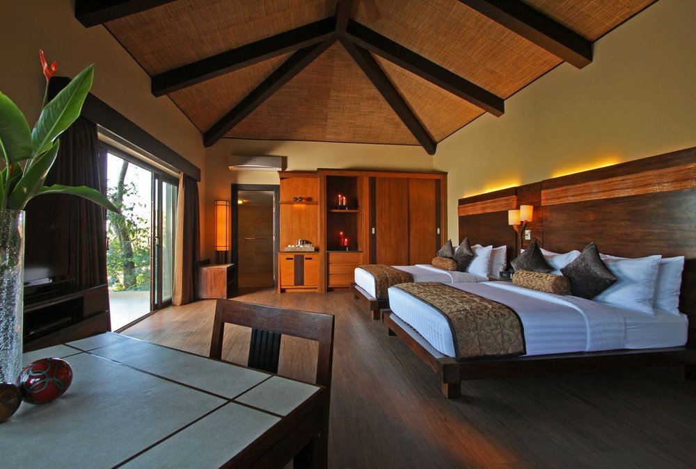 spacious resort room with two beds