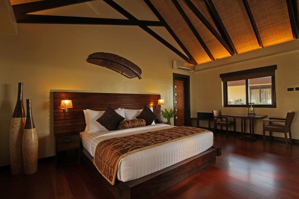 resort room with small dining table for two