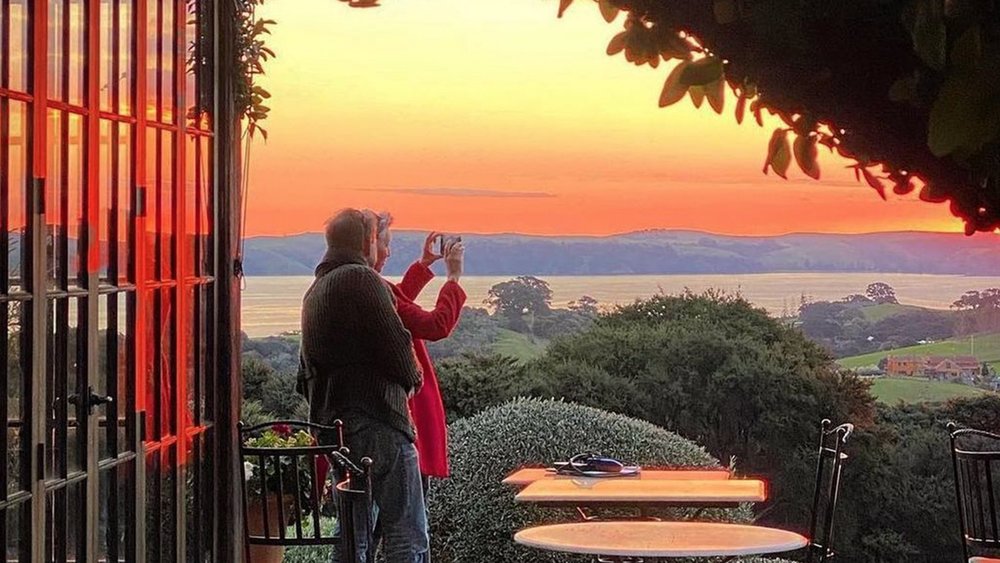 Captivating sunsets and delicious wine make for an unbeatable combination Image credit: @mudbrick_nz