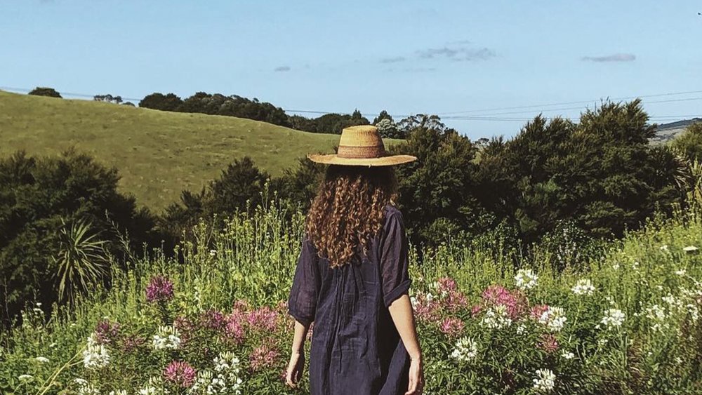 Floral surroundings and fruity wines await you at Awaroa Vineyard. Image credit: @mywaiheke