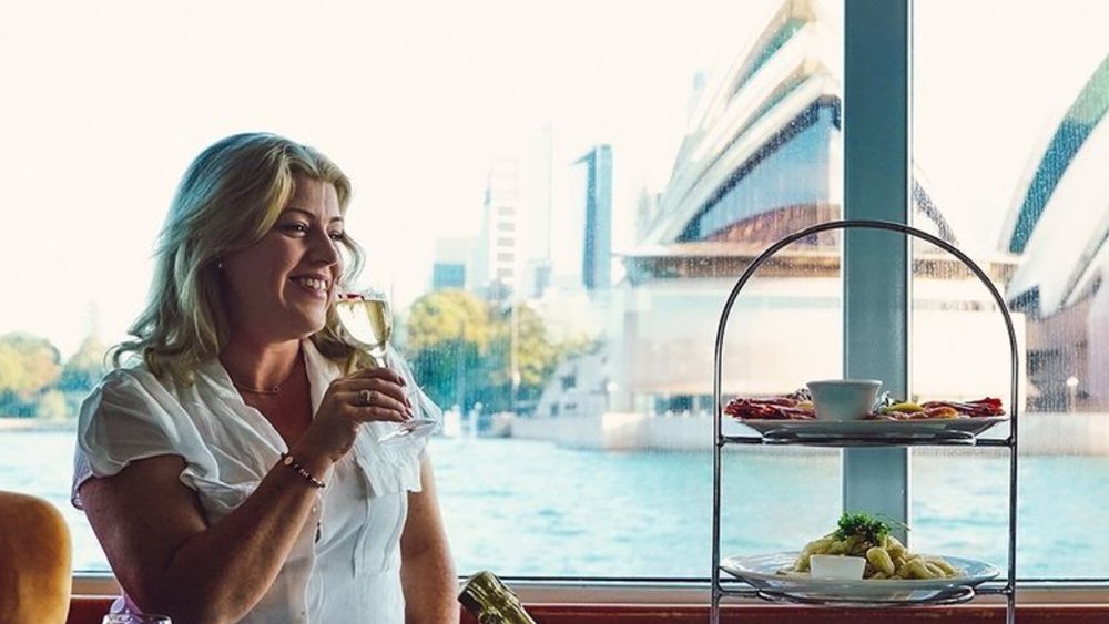 Enjoy delectable food and good conversation as you cruise around the harbour. Image credit: @captaincookcruises on Instagram