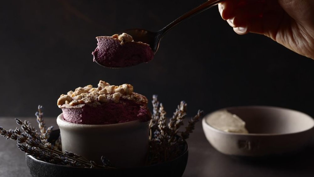 End the dinner on a sweet note with Aria’s signature souffle Credit: @aria__restaurant