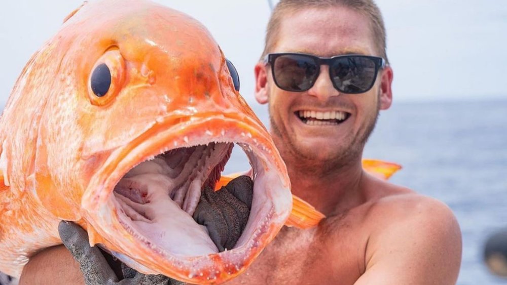 Smiling with a Huge Fish! Image credits - @namotuisland on Instagram