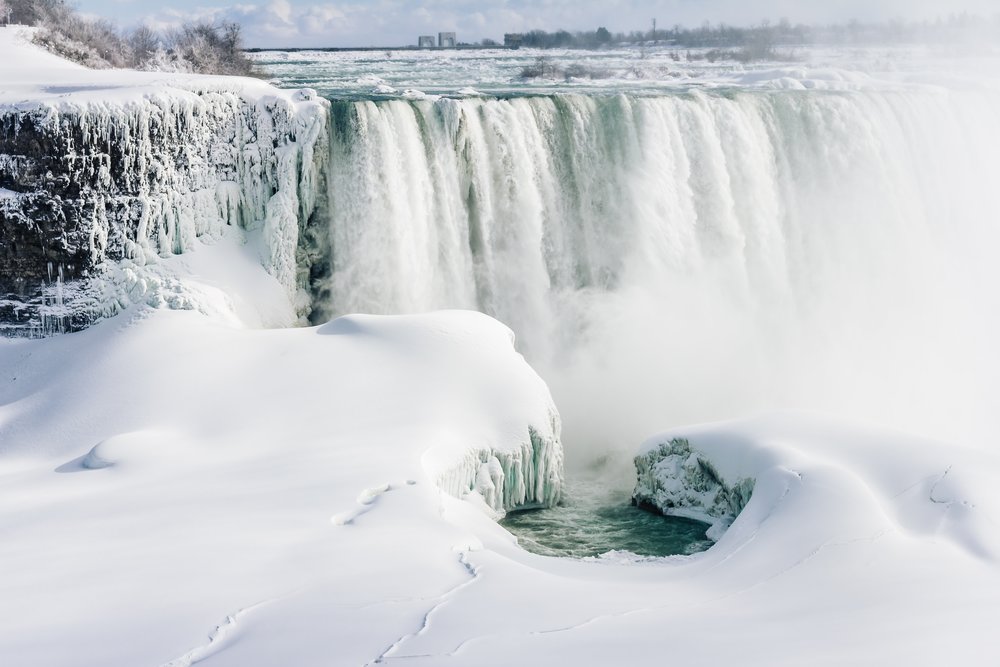The Niagara Falls or the Frozen Falls? You tell us which! - Image Credits: Elvir K on Unsplash