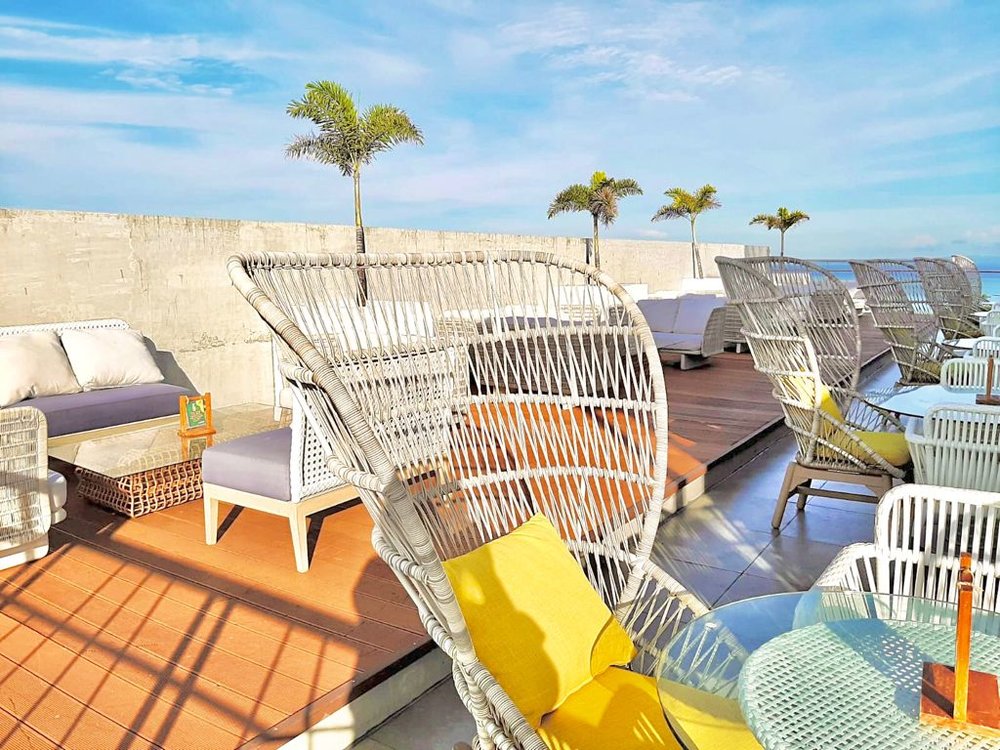 hotel rooftop lounge basked in sunlight