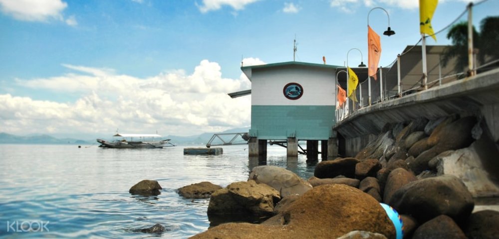overwater cottage with rocky waterfront