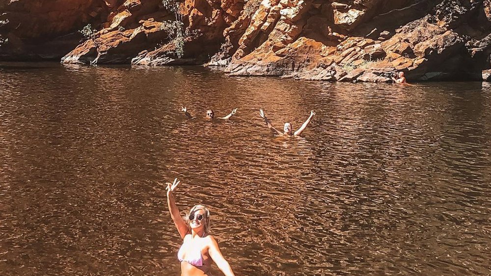 Go on a refreshing swim at the West MacDonnell Ranges. Credit: @lauragalbraith