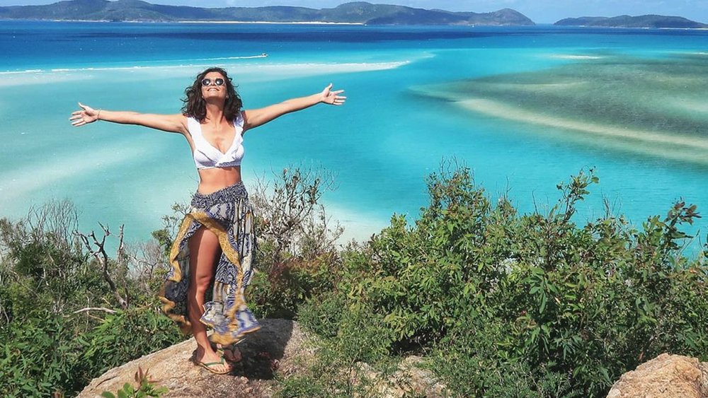 White sand swirls and pristine blue waters await you at Whitsundays. Credit: @cwaddell88
