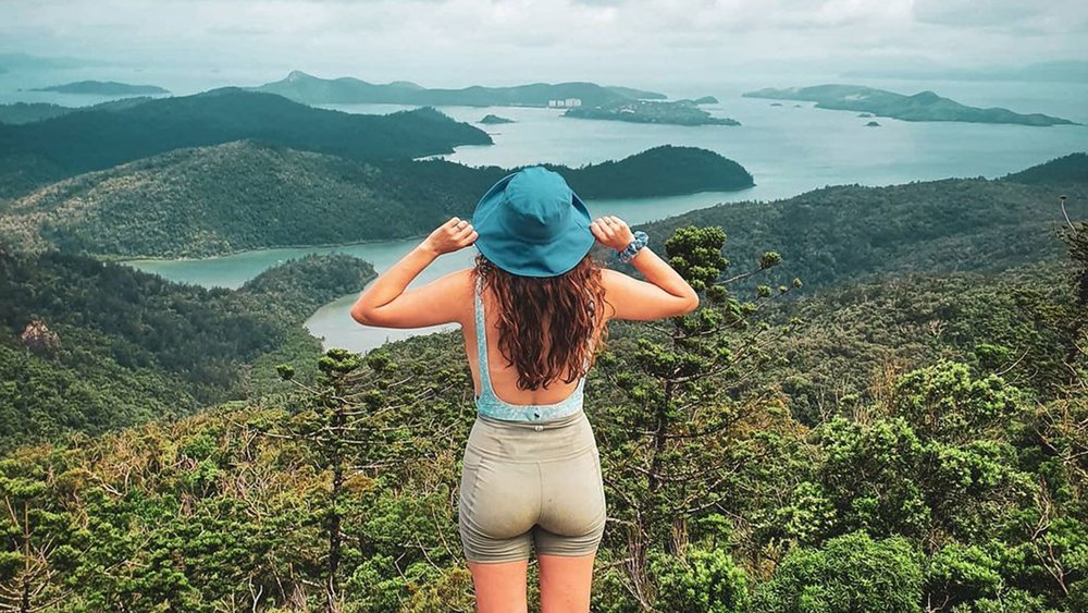 Be rewarded with unbeatable views when you climb the Whitsunday Peak. Credit: @thetraxtribe