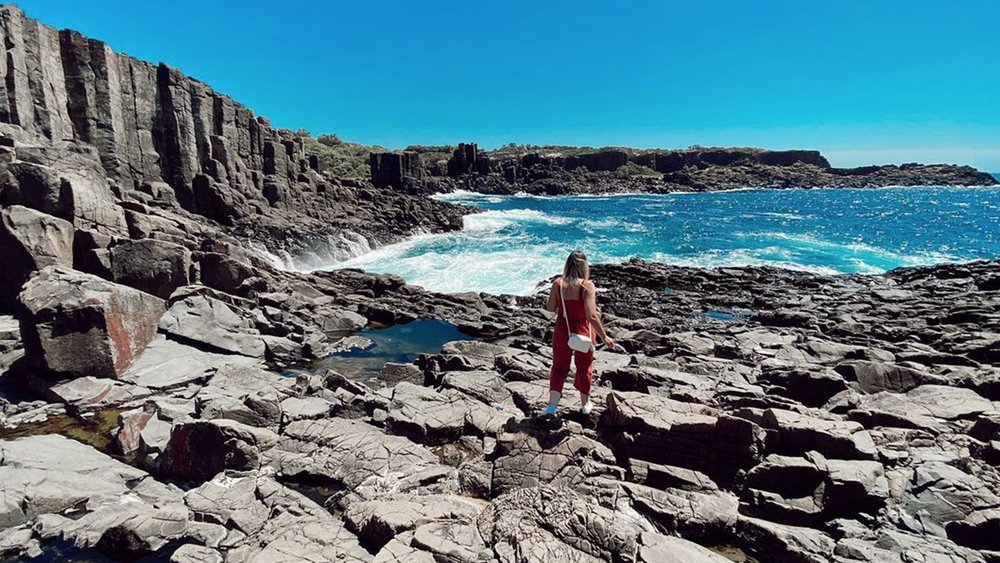 Take in the view of the dark basalt formations and bright blue waters at the Bombo Quarry. Image credit: @1ciftyolcu on Instagram