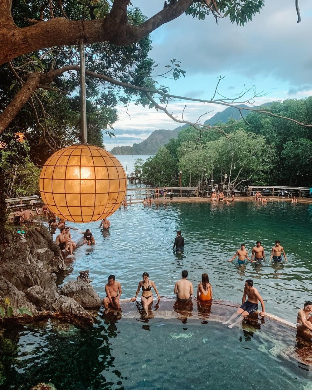 people hanging out in hot springs