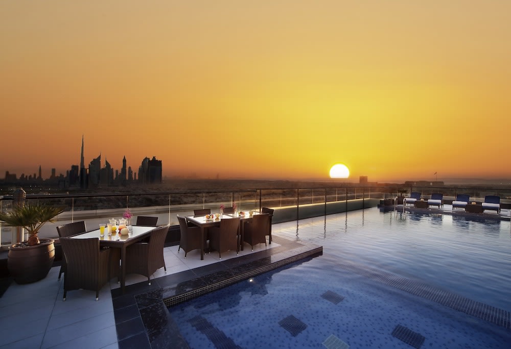 Watch the romantic Dubai sunset atop Park Regis Kris Kin