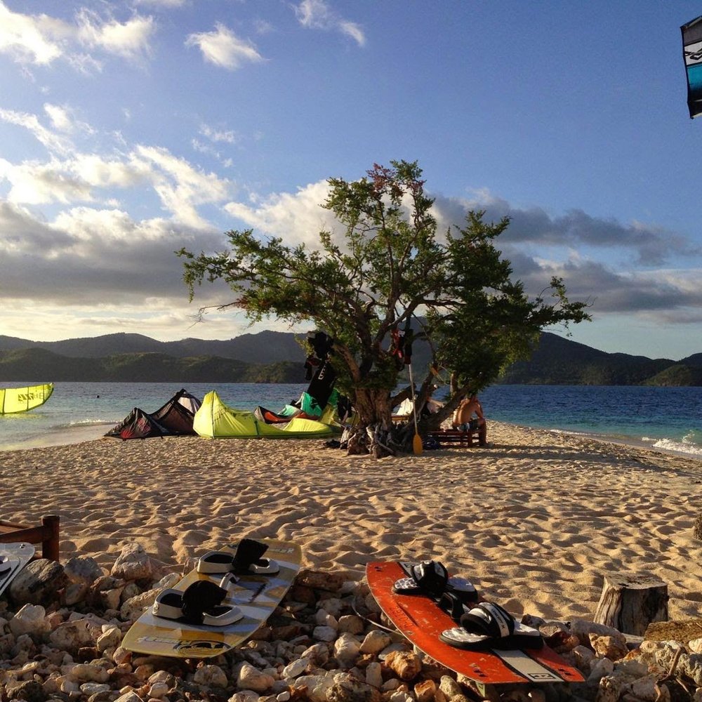 sandy beach with tents