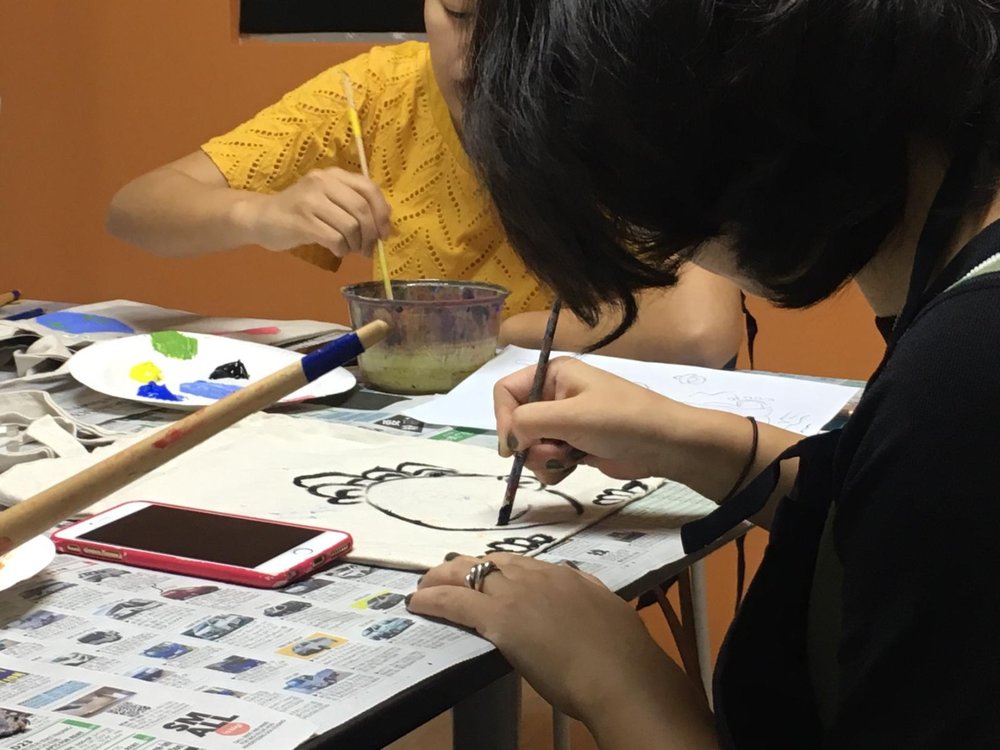 Participant painting for the art jamming workshop