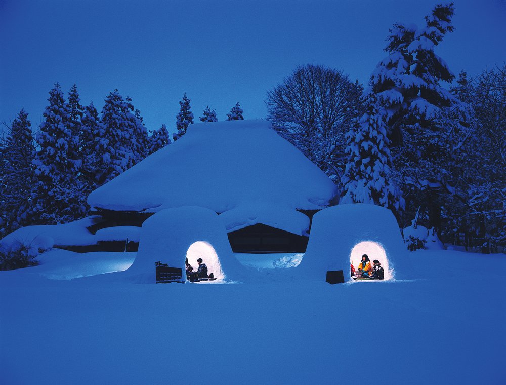 Tourists in igloos