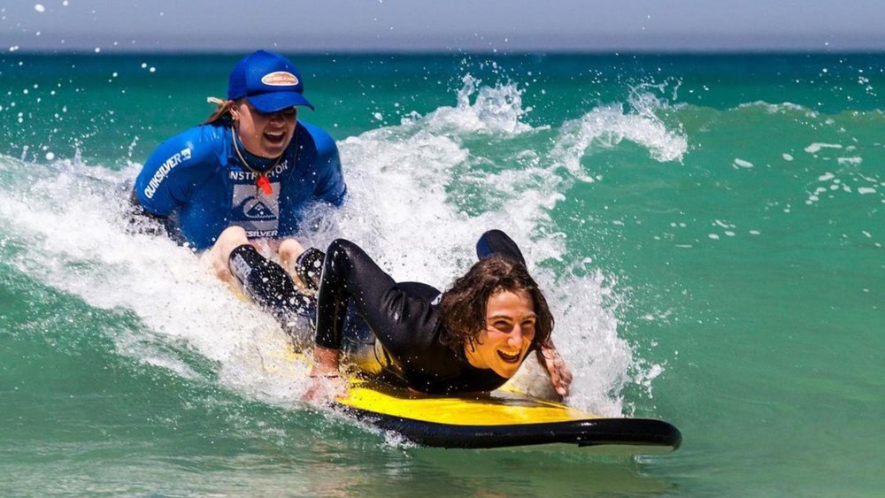Learn how to balance on the water at Noosa Heads. Image credits: @gorideawave on Instagram