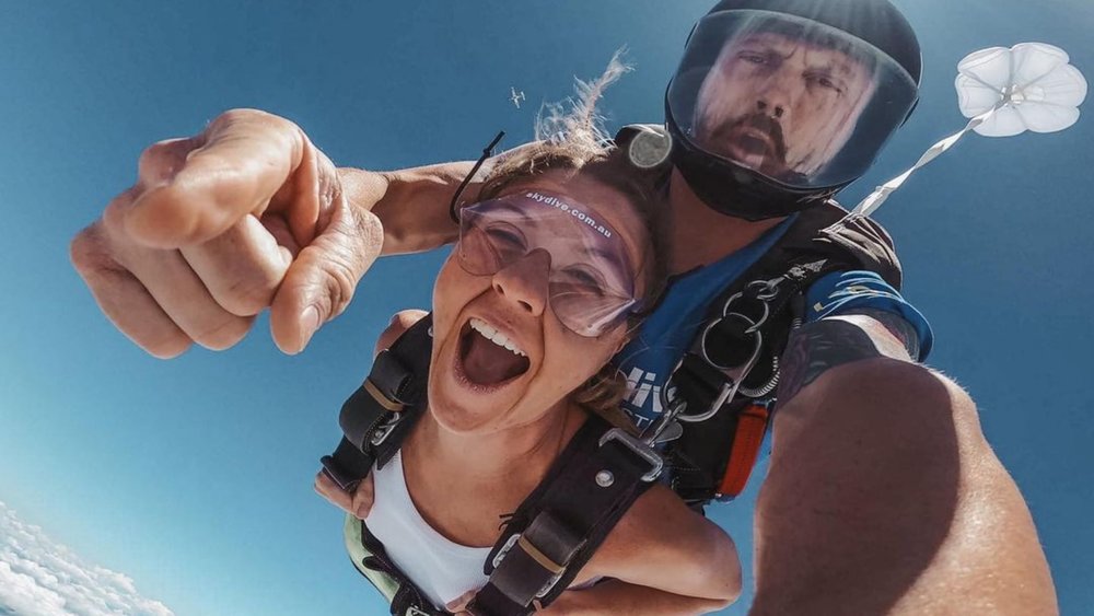 Face your fears and take the leap of faith on this Noosa skydive experience. Image credits: @laura_fenwick on Instagram
