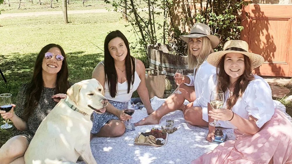 Take advantage of the nice weather and have some wine on your picnic. Image credit: @debeaurepairewines on Instagram