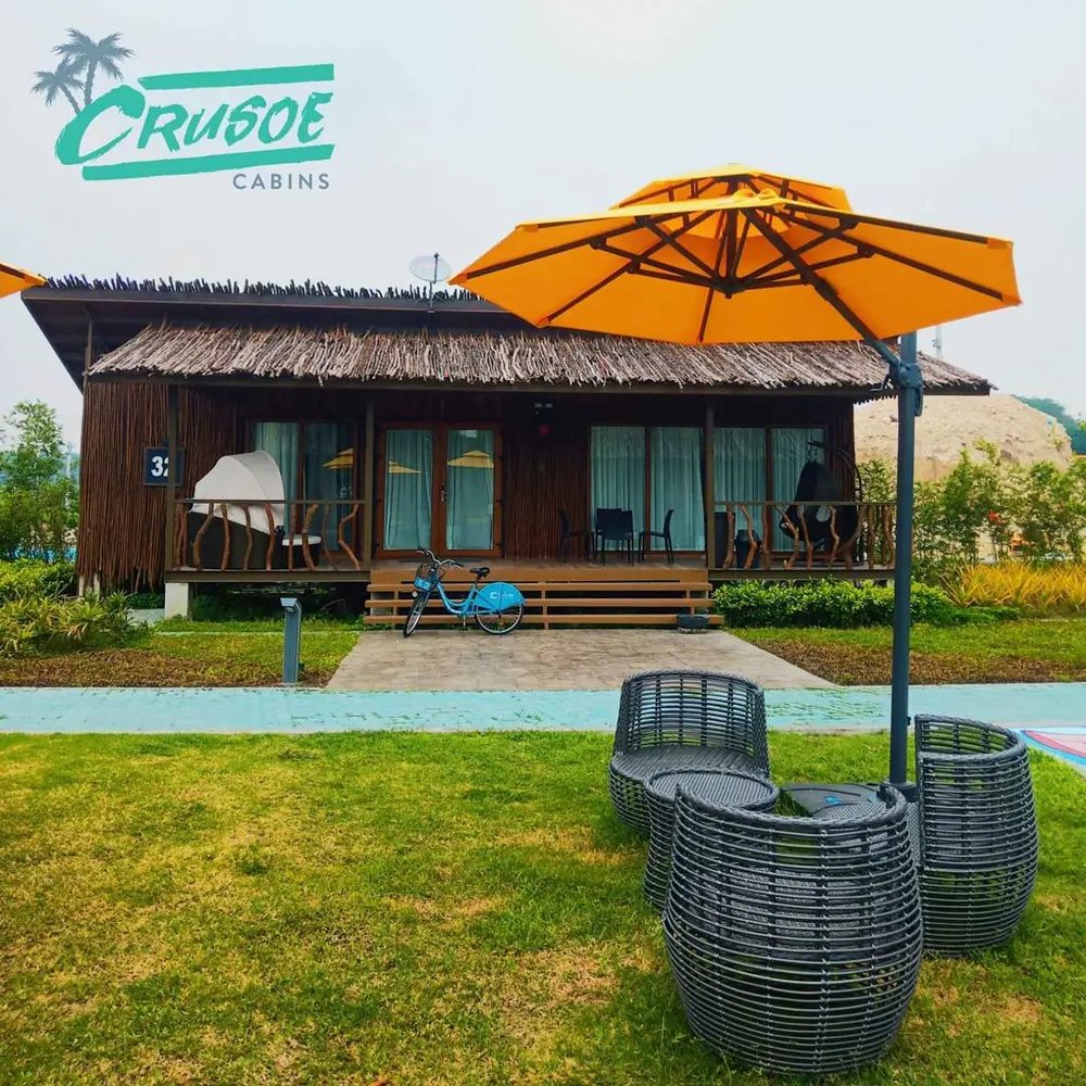 cabin with outdoor tables and chairs