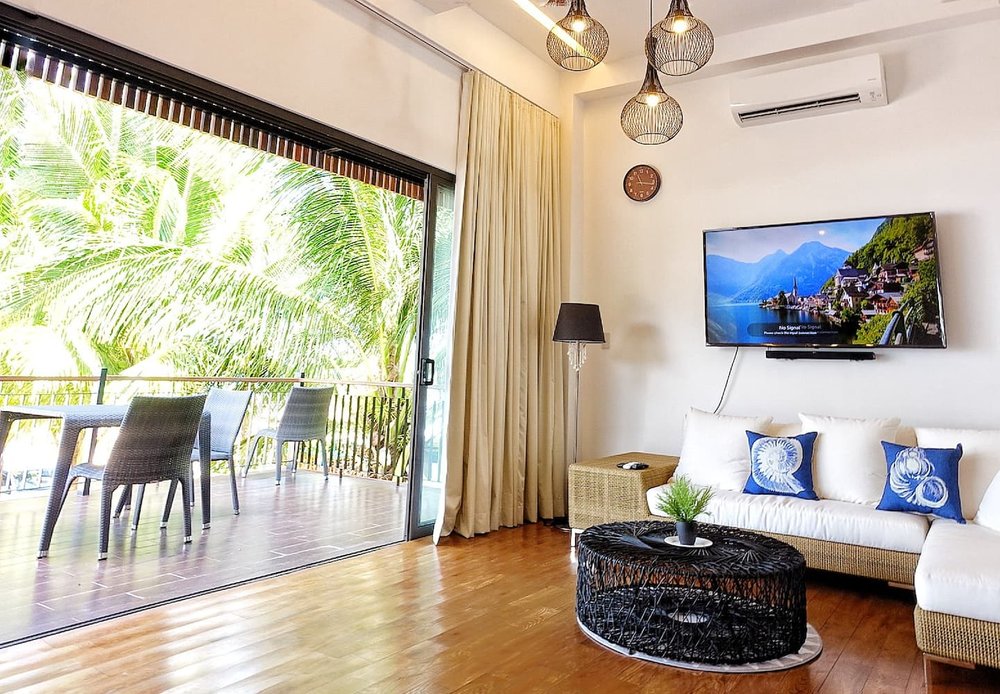 living area next to big sliding windows