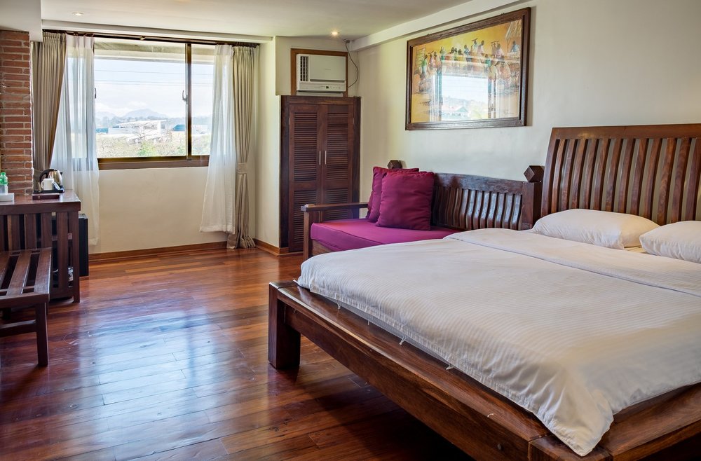 hotel room with wooden accents