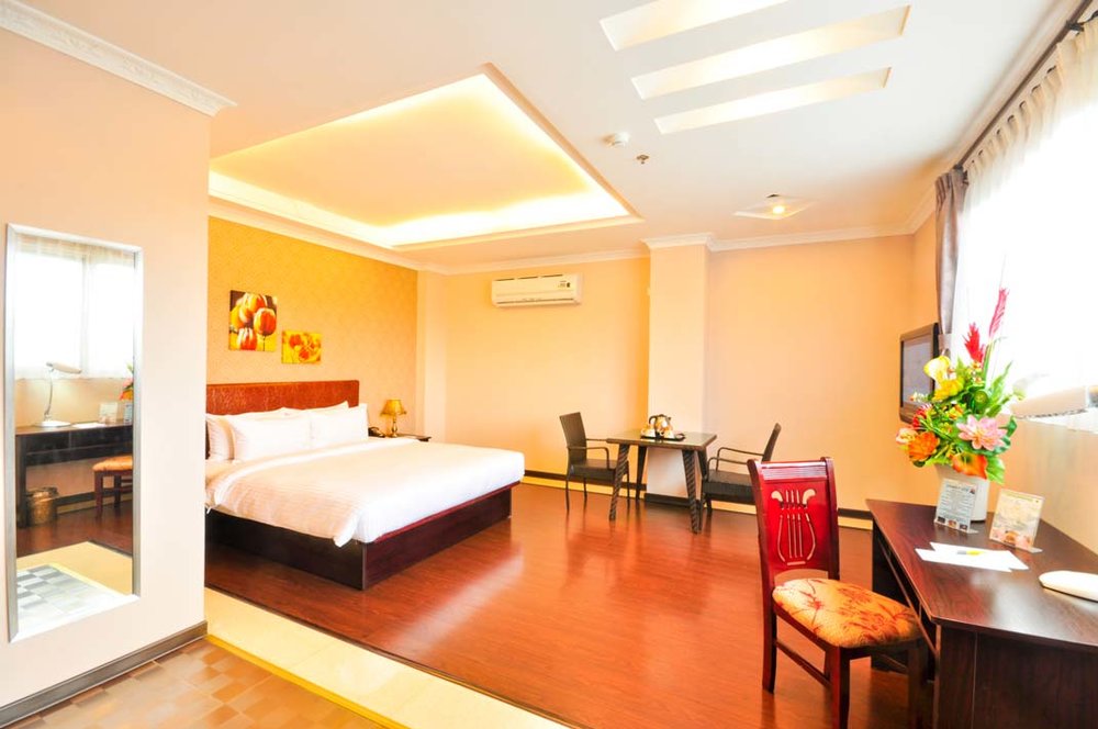 hotel suite with wooden floors