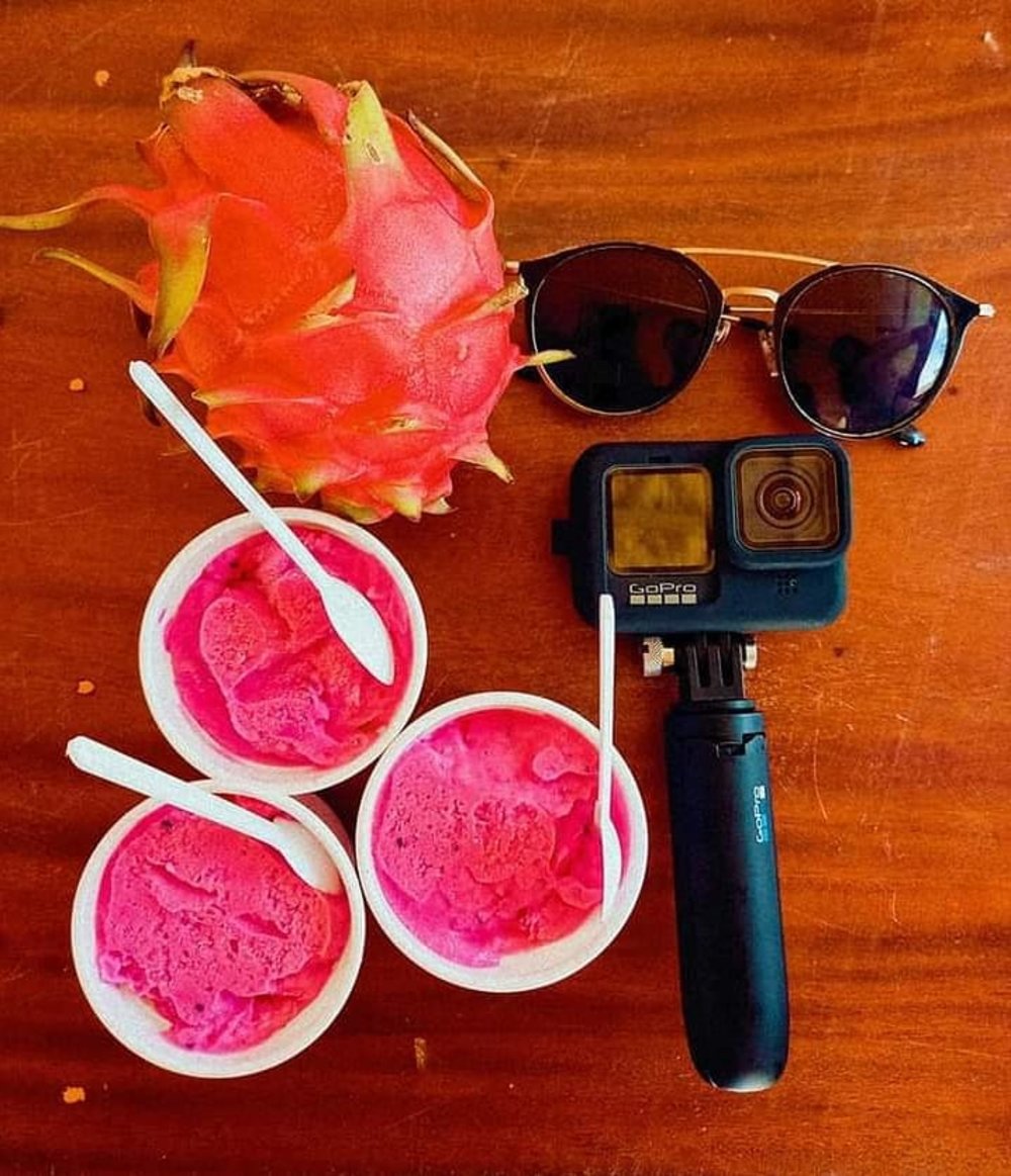 dragon fruit ice cream cups on table with dragon fruit and gopro