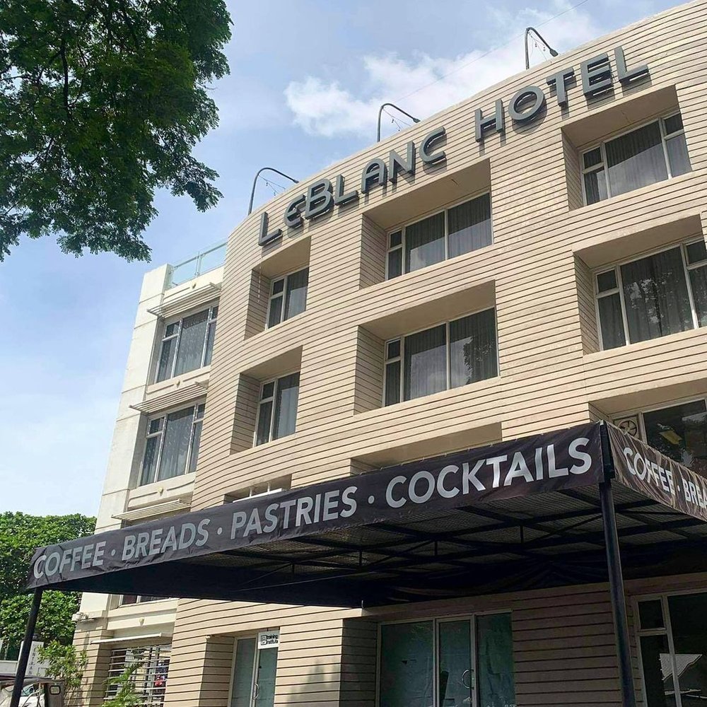 hotel entrance with black tent