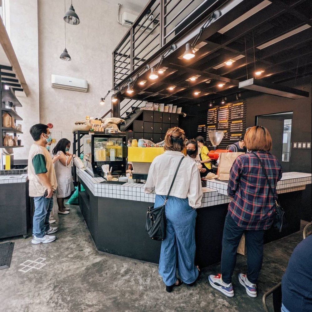 people ordering by cafe bar