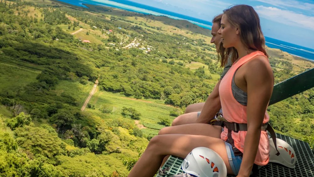 Look down (if you can) and soak in the scenery before you go ziplining.
