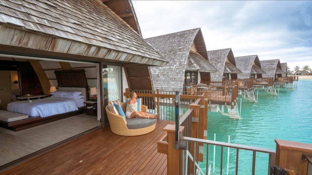 Enjoy a panoramic view of blue lagoons and the lush Momi Bay mountains right from your accommodation at Fiji Marriott Resort. "Credit: @fijimarriottresortmomibay"