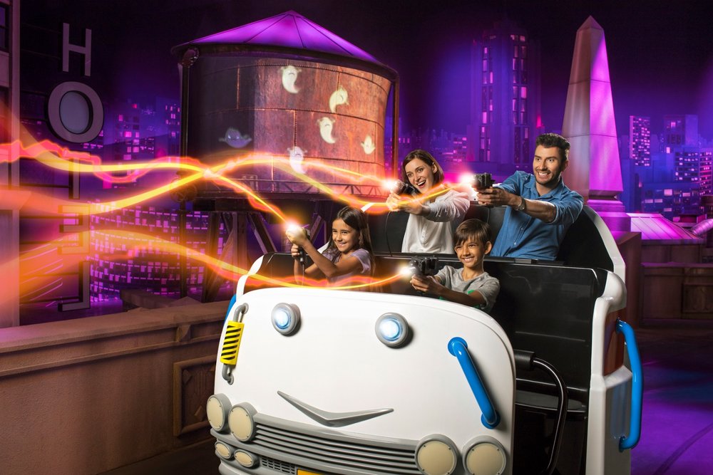 family enjoying an attraction at motiongate dubai