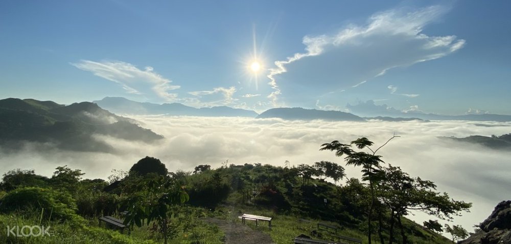 cliff side overlooking sea of clouds