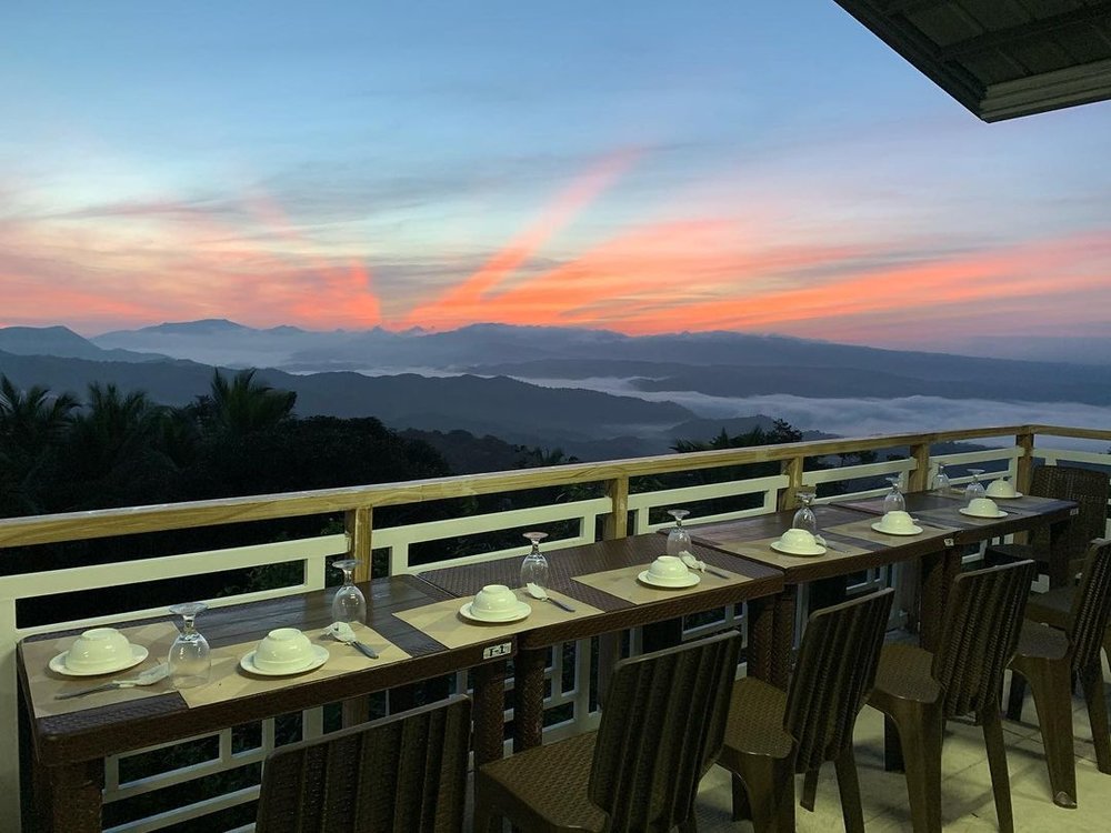 alfresco dining in the mountains during sunset