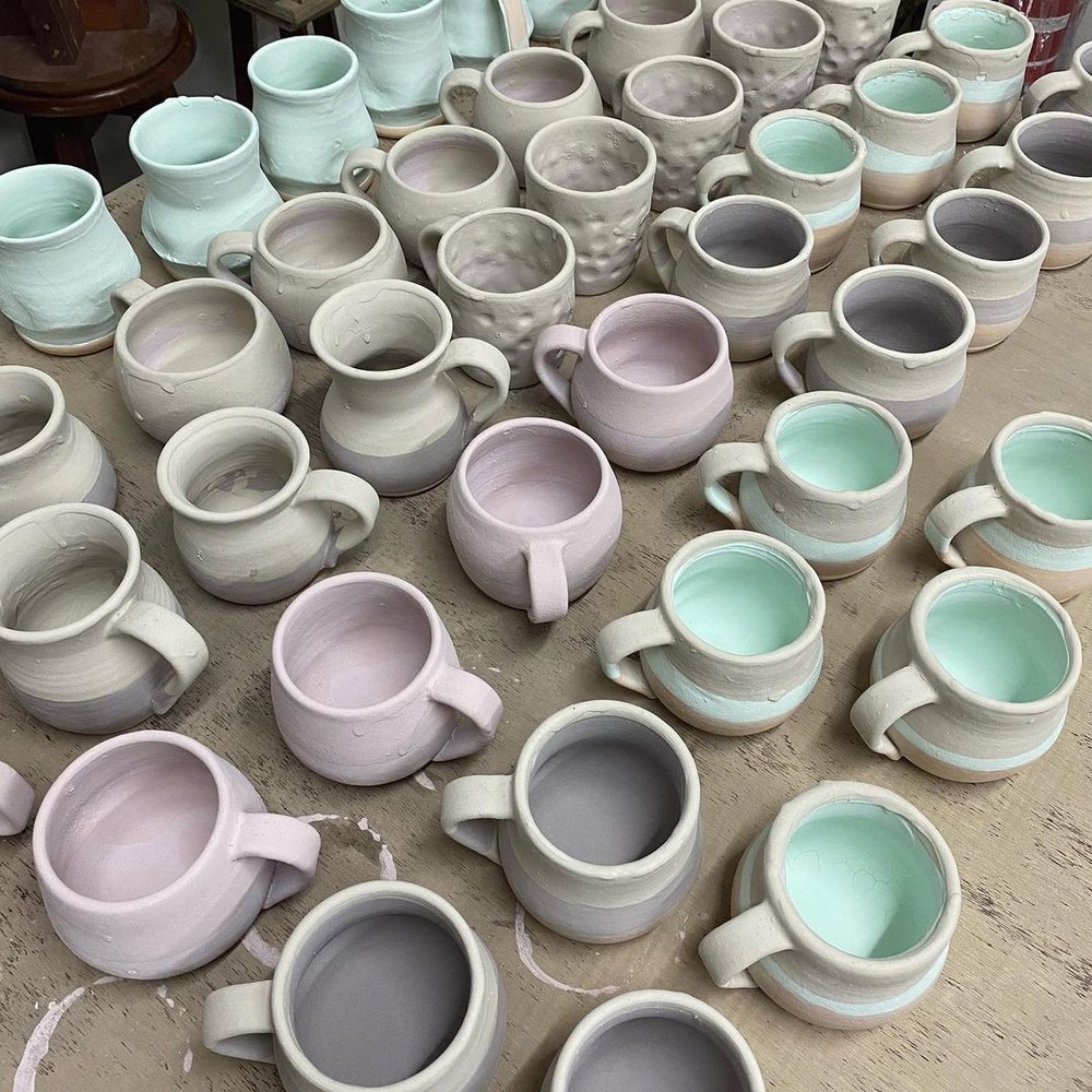 dozens of clay pots