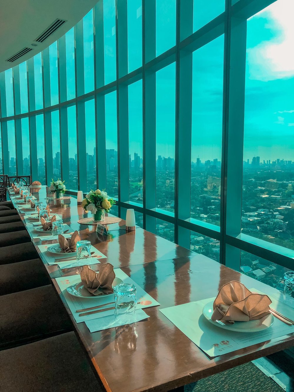 restaurant dining area overlooking city