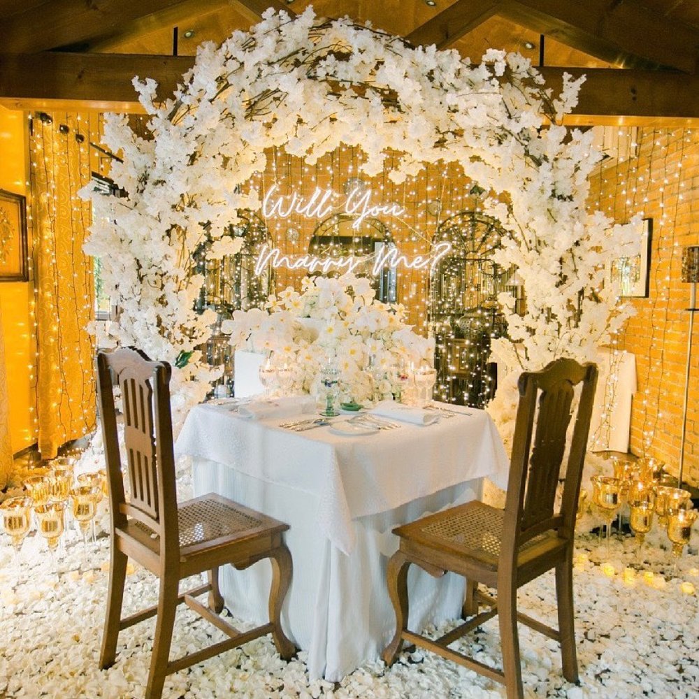 decorated dining table with white floral accents