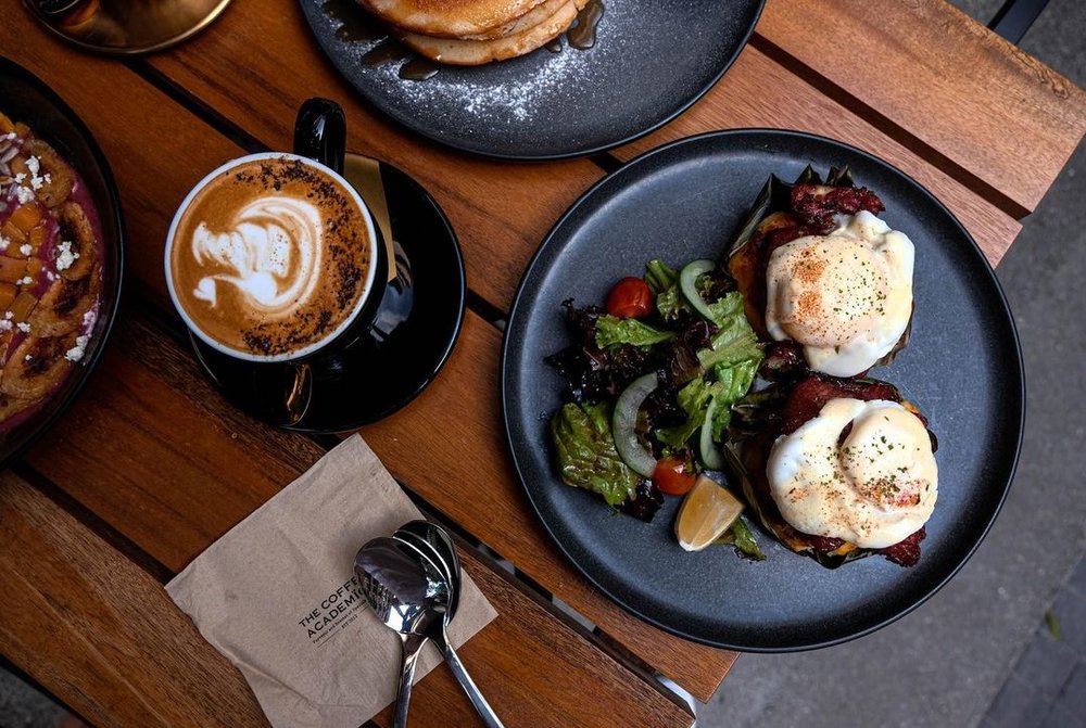 top view of breakfast cafe food in plates